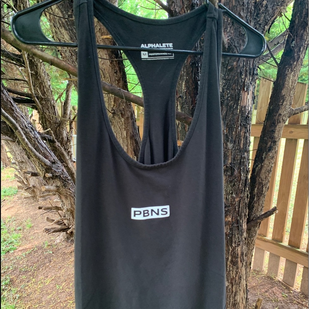 Alphalete Proud But Never Satisfied Stringer